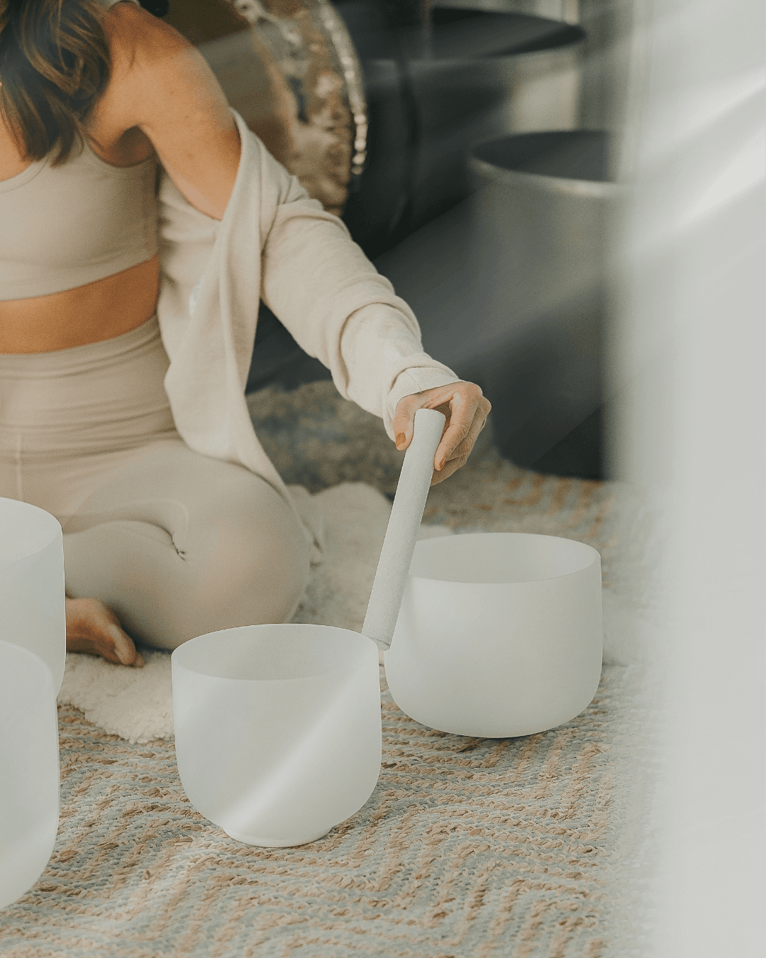 Spiritual practitioner with singing bowls
